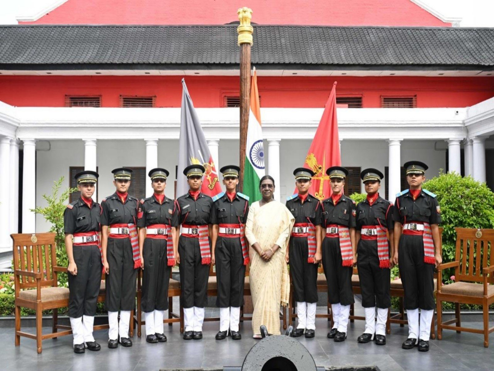 Women and male officer cadets participate in a passing out parade during a military academy graduation ceremony in India.