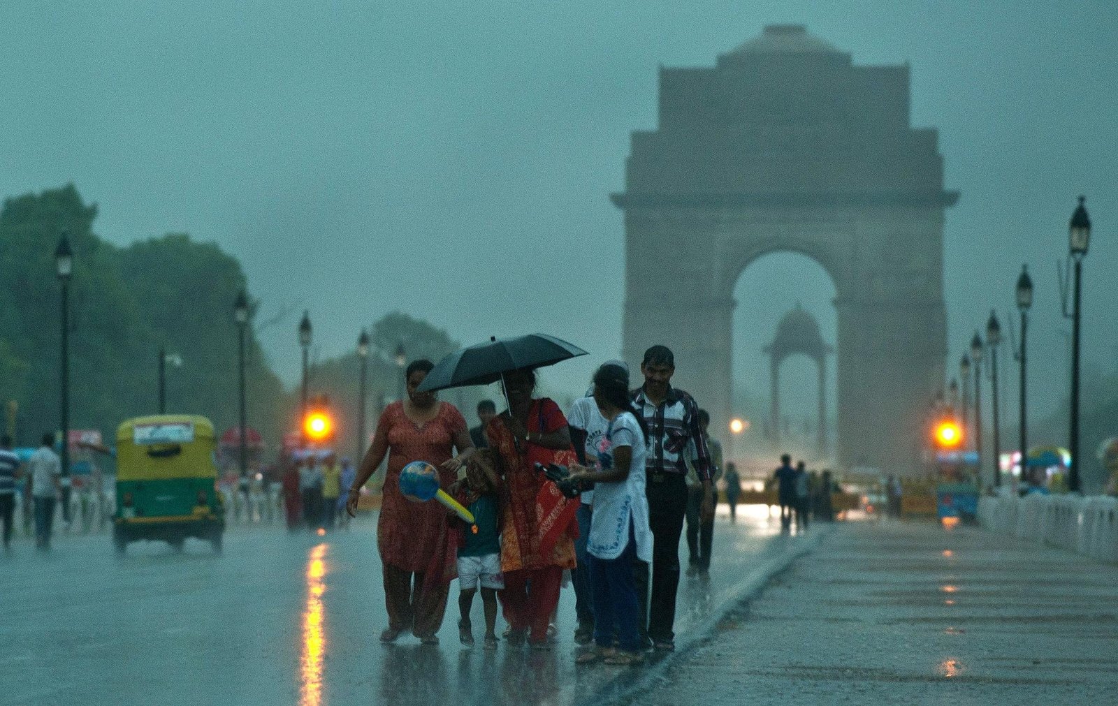 Monsoon rains arrive in India as people get relief from intense summer heat